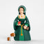 Figurine of a Anne Boleyn, a woman in historical attire holding a flower, with a dog at her feet, on a white background