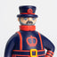 Close-up of Beefeater Collectable Cities figure in blue and red uniform