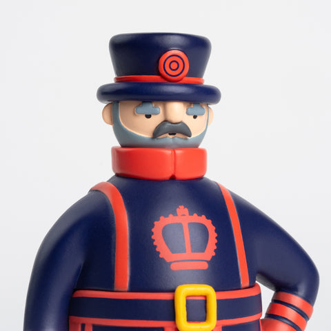 Close-up of Beefeater Collectable Cities figure in blue and red uniform
