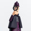 Close-up of Sherlock Holmes Collectable Cities figure holding a magnifying glass