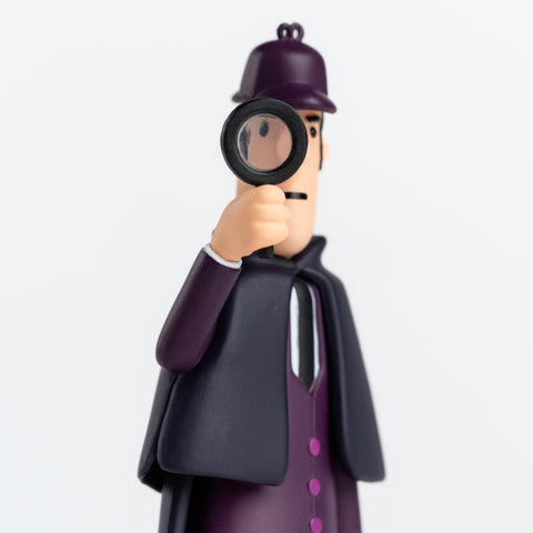 Close-up of Sherlock Holmes Collectable Cities figure holding a magnifying glass