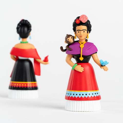 Two Frida Kahlo collectible figures shown from back and front views