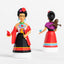 Two Frida Kahlo collectible figures shown from front and back views