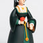 Figurine of Anne Boleyn in traditional attire holding a red flower and a book on a white background